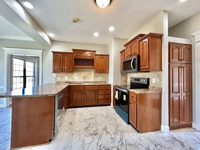 Welcome to this beautiful two-story brick home located in the - photo 20