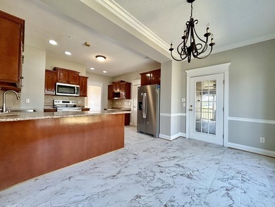 Welcome to this beautiful two-story brick home located in the - photo 22