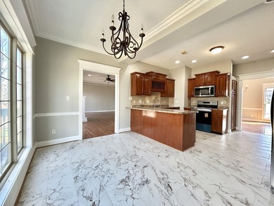 Welcome to this beautiful two-story brick home located in the - photo 23
