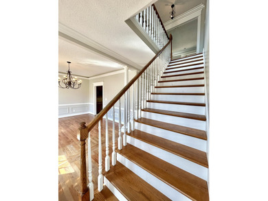 Welcome to this beautiful two-story brick home located in the - photo 27