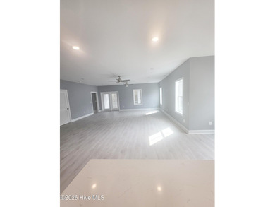 Perfectly located 4 Bedroom / 3.5 Bath home with an ADDITIONAL