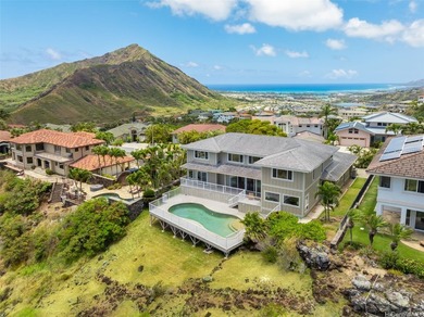 Perched along the Koolau Mountain range in the prestigious - photo 1