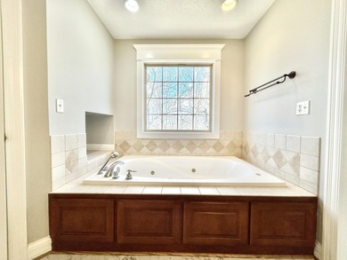 Welcome to this beautiful two-story brick home located in the - photo 33