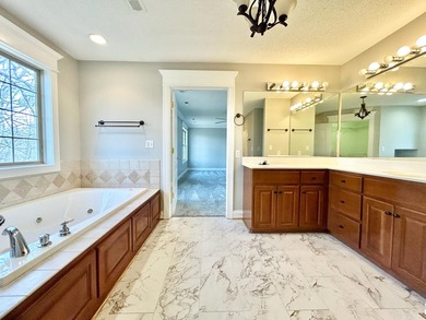 Welcome to this beautiful two-story brick home located in the - photo 41