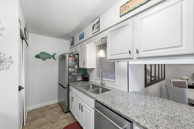 Just a very short walk to the beach, this beautifully maintained