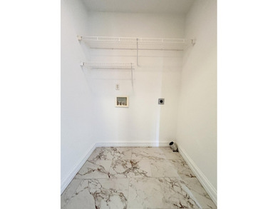 Welcome to this beautiful two-story brick home located in the - photo 50