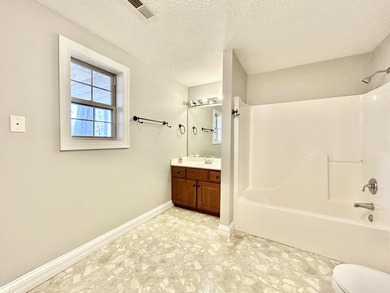 Welcome to this beautiful two-story brick home located in the - photo 57
