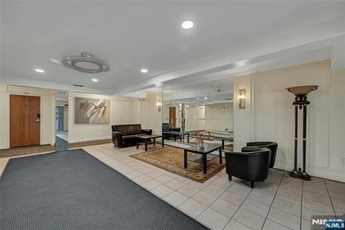 This professionally updated 1-bedroom, first-floor unit at