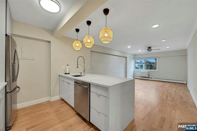 This professionally updated 1-bedroom, first-floor unit at