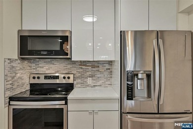 This professionally updated 1-bedroom, first-floor unit at