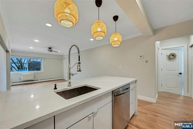 This professionally updated 1-bedroom, first-floor unit at