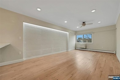 This professionally updated 1-bedroom, first-floor unit at