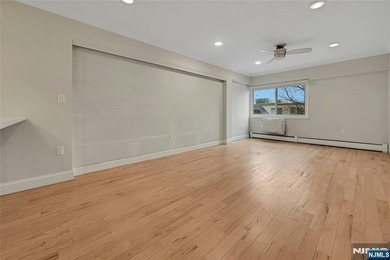 This professionally updated 1-bedroom, first-floor unit at