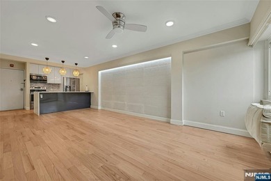 This professionally updated 1-bedroom, first-floor unit at