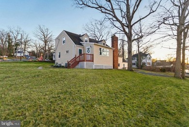 Welcome home to this beautifully renovated expanded Cape Cod - photo 2