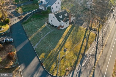 Welcome home to this beautifully renovated expanded Cape Cod - photo 5
