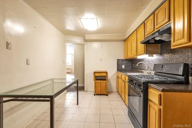 Prime Gravesend location! This 2 family property is an - photo 16