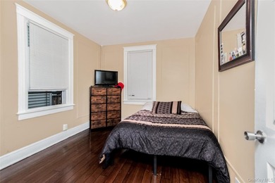 Located in the heart of Pelham Bay, 2810 Harrington Avenue is a - photo 9