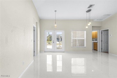This stunning 4-bedroom, 2.5-bath waterfront pool home is - photo 7