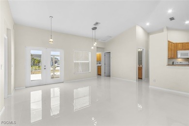 This stunning 4-bedroom, 2.5-bath waterfront pool home is - photo 8