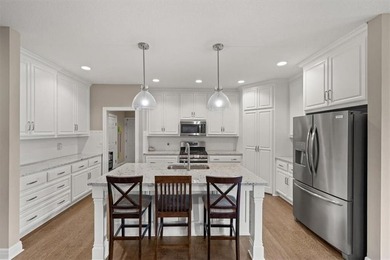 Upgrades galore in southwest Olathe. Zero-entry (no steps!)