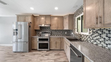 Welcome to 1319 Capri Drive, an end-unit waterfront townhome - photo 4