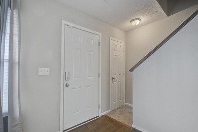Move in ready two bedroom townhouse featuring a cozy fireplace - photo 4