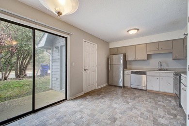 Move in ready two bedroom townhouse featuring a cozy fireplace - photo 10