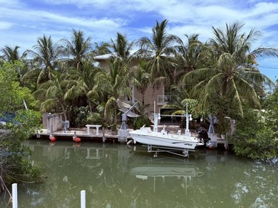 Bring your water toys & experience island living in this newly - photo 20