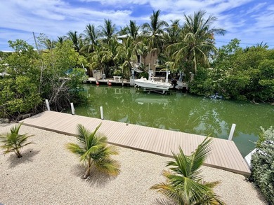 Bring your water toys & experience island living in this newly - photo 21