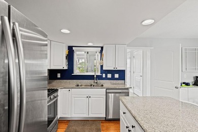 Waterfront with stunning views, a rare 3-bedroom, 3.5-bath with - photo 9