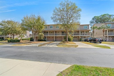 Welcome to this charming 4-bedroom, 3.5-bath townhome in the - photo 3