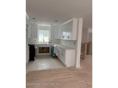 NEW CONSTRUCTION. Beautiful 2 Family 6 over 6 located on - photo 3