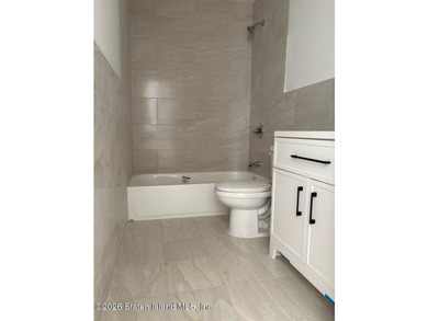 NEW CONSTRUCTION. Beautiful 2 Family 6 over 6 located on - photo 5
