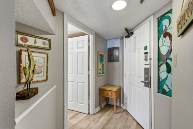 Dive into oceanfront luxury with this stylishly renovated - photo 2