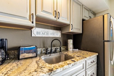 Dive into oceanfront luxury with this stylishly renovated - photo 9