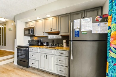 Dive into oceanfront luxury with this stylishly renovated - photo 10
