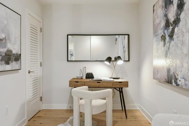 Step into this stunning top-floor 1-bedroom, 1.5-bathroom home - photo 4