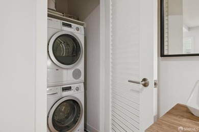Step into this stunning top-floor 1-bedroom, 1.5-bathroom home - photo 5