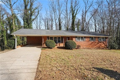 Classic 3 BR, 2 BA brick ranch offers charm, *character*, and