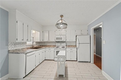 Classic 3 BR, 2 BA brick ranch offers charm, *character*, and