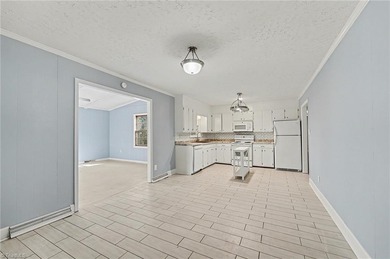 Classic 3 BR, 2 BA brick ranch offers charm, *character*, and