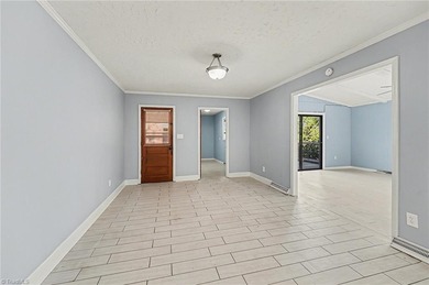 Classic 3 BR, 2 BA brick ranch offers charm, *character*, and