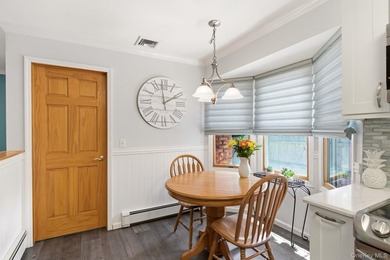 Welcome to this beautifully updated L-Shaped Ranch nestled in - photo 7