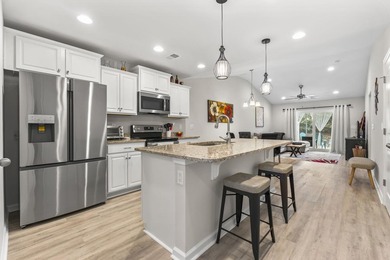Welcome to 164 Machrie Loop Unit B - a beautifully maintained - photo 2
