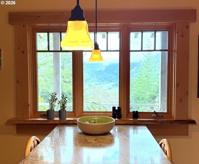 Perched on 42 pristine acres overlooking the Rogue River, this - photo 11