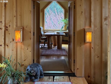 Perched on 42 pristine acres overlooking the Rogue River, this - photo 12