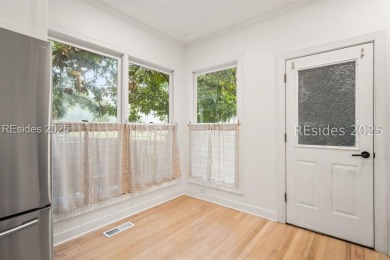 Modern End-Unit Townhome with Golf Course Views! This