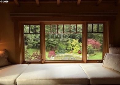 Perched on 42 pristine acres overlooking the Rogue River, this - photo 14