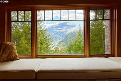 Perched on 42 pristine acres overlooking the Rogue River, this - photo 15
